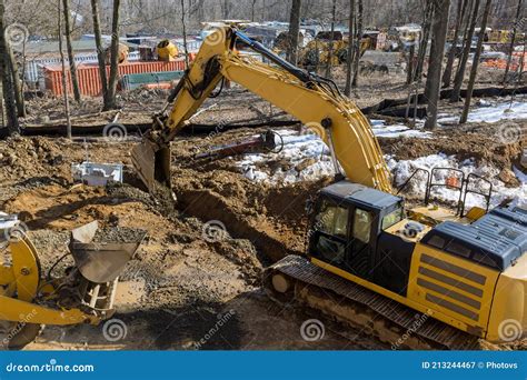 digging ditch with skid steer|digging a drainage ditch.